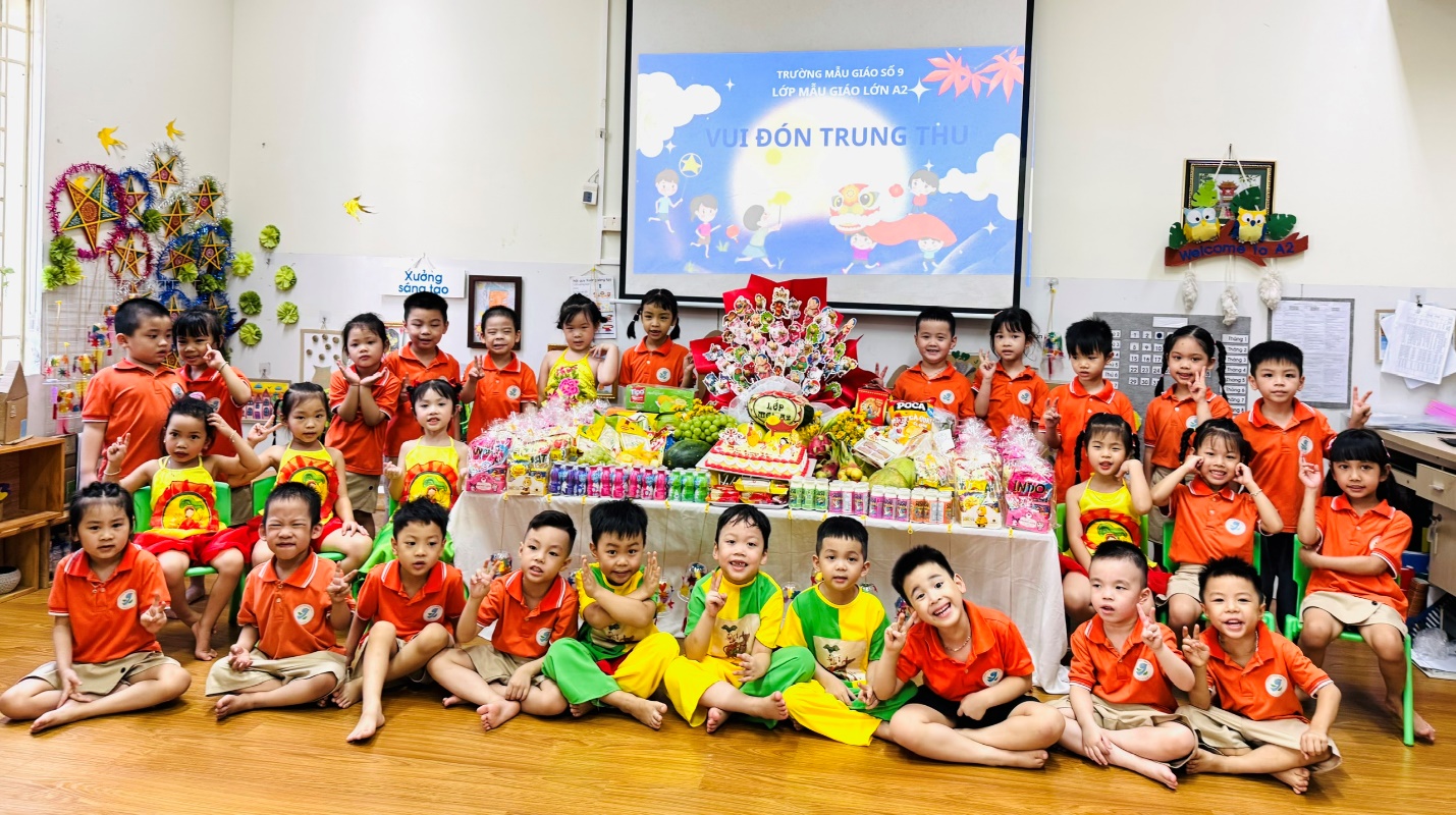 A group of children sitting on the floor in front of a table with food

AI-generated content may be incorrect.