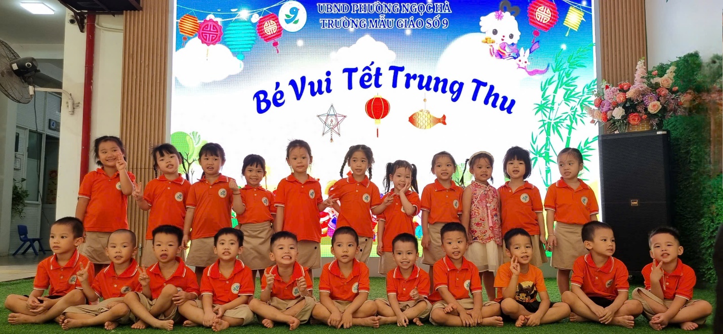 A group of children in orange shirts

AI-generated content may be incorrect.