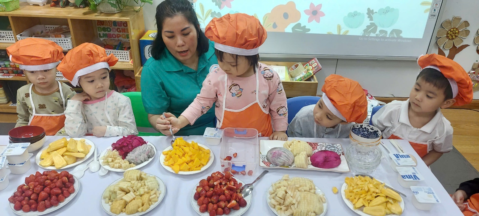 A person and two children in a kitchen
AI-generated content may be incorrect.