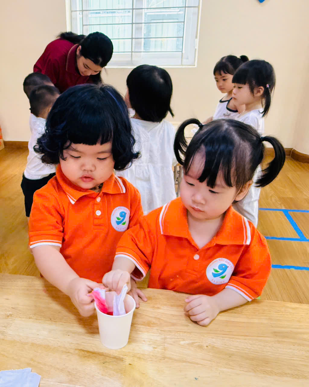 A group of children in a classroom
AI-generated content may be incorrect.