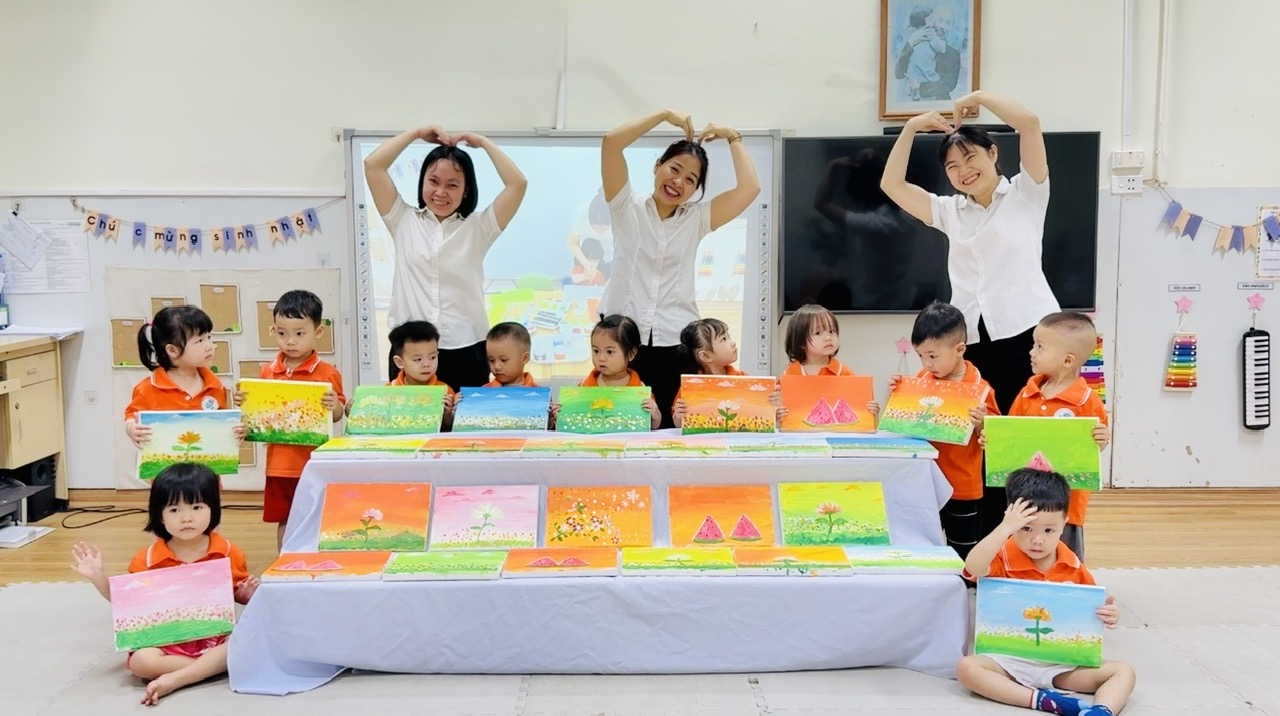 A group of children and adults posing for a photo
AI-generated content may be incorrect.
